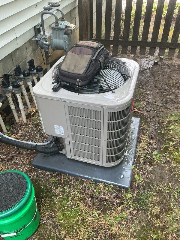 Completed scheduled air conditioning tune-up and preventive maintenance on 2019 Bryant condenser unit. Performed comprehensive system inspection, verified proper operation of all components including fan motor and blade assembly, checked electrical connections at disconnect box, and confirmed refrigerant levels and overall system performance. Unit operating within normal parameters with no issues identified.
