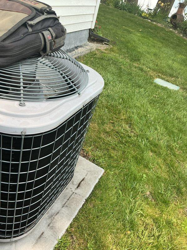 Completed routine maintenance tune-up on residential HVAC system per service contract. System was operating properly upon arrival with no reported issues. Performed comprehensive inspection of outdoor condenser unit, verified refrigerant lines and electrical connections were secure, and confirmed proper airflow through fan assembly. Membership was expired and reset to restore active service coverage. All components tested within normal operating parameters and system left in good working condition.