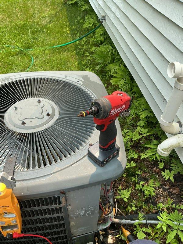 Completed comprehensive air conditioning tune-up on outdoor condenser unit, performing standard preventive maintenance procedures including electrical testing with multimeter, component inspection, and system diagnostics. Collected payment for annual maintenance renewal and rescheduled follow-up appointment for continued service coverage.