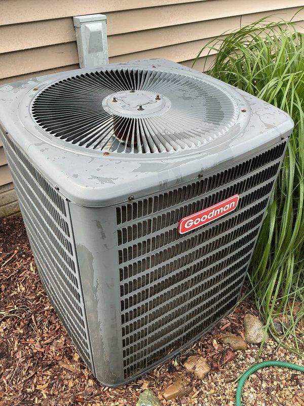 Completed annual membership air conditioning tune-up on Goodman condensing unit. Performed comprehensive system inspection, cleaned condenser coils, verified proper airflow through heat exchanger fins, and confirmed operational status of all components. Unit operating within normal parameters upon completion of maintenance service.