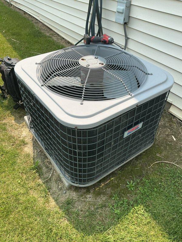 Completed routine air conditioning tune-up on outdoor condensing unit. Performed standard maintenance inspection, verified proper operation of condenser fan and compressor, and confirmed refrigerant lines and electrical connections were secure. Unit operating within normal parameters upon completion.