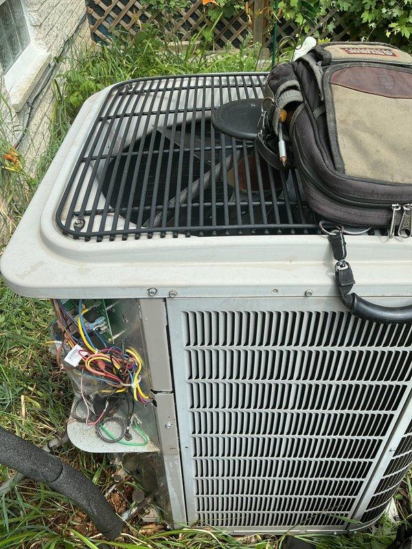 Performed annual maintenance on a 16-year-old Bryant air conditioning system. Completed comprehensive AC tune-up including inspection of outdoor condensing unit, removal of access panels to examine electrical components and wiring connections, verification of proper system operation, and standard preventative maintenance procedures. System confirmed to be working properly with no issues found during inspection.