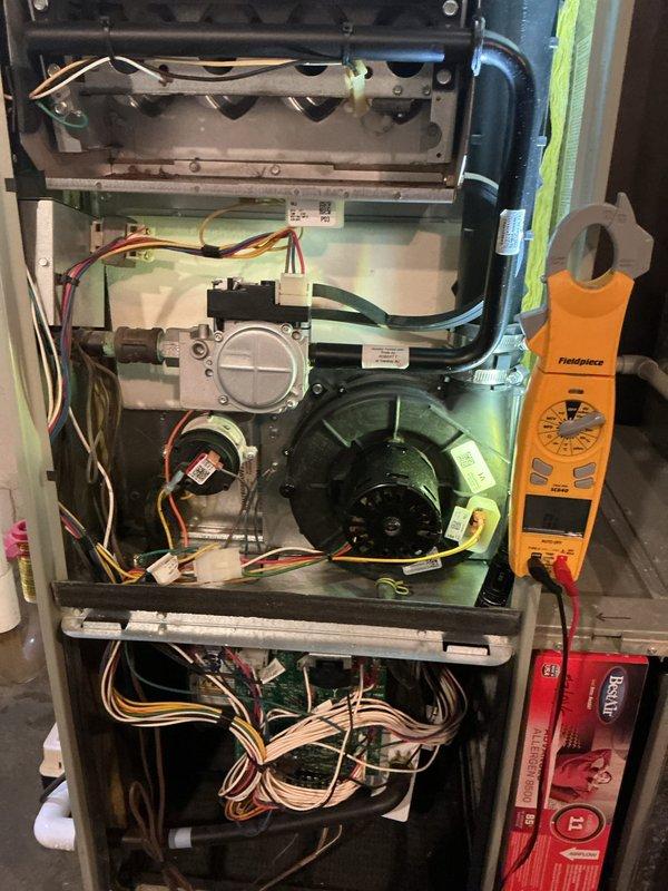 Completed membership multi-system tune-up on gas furnace and air conditioning unit. Performed comprehensive inspection of AC system in response to customer report of refrigerant leak that had occurred approximately one week prior but had since stopped. Conducted thorough examination of all refrigerant lines, connections, and coils for signs of active leakage or residual evidence of previous leak. Inspected furnace components including heat exchanger, blower motor assembly, control board, and electrical connections. Verified proper operation of all safety controls and wiring throughout both systems. All systems found to be operating within normal parameters with no active leaks detected at time of service.