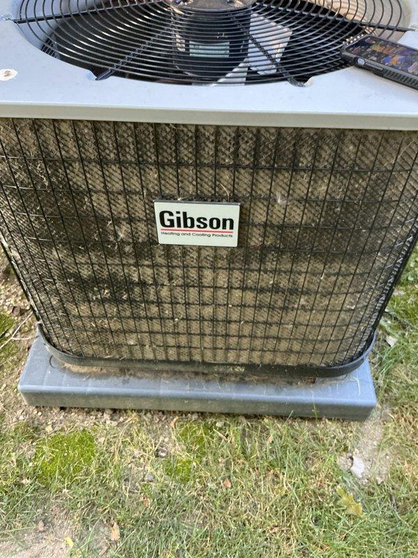 Completed comprehensive AC tune-up on Gibson outdoor condenser unit. Performed standard preventative maintenance including inspection of all major components, cleaning of condenser coils and grille surfaces to remove accumulated debris and dirt buildup, verification of proper fan operation and guard integrity, and confirmation of unit functionality. System operating within normal parameters upon completion of service.