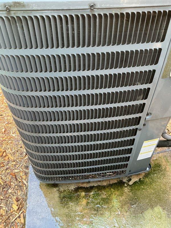 Completed scheduled air conditioning tune-up and preventative maintenance on outdoor condensing unit. Inspected condenser coil and found moderate accumulation of dirt, dust, and debris between fins, which was documented for cleaning to restore optimal heat transfer efficiency. Unit operational in cooling mode upon completion of service visit.