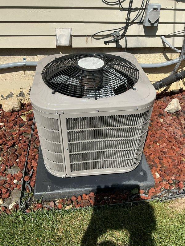 Completed comprehensive AC tune-up and system reset following air quality concerns. Performed full inspection of outdoor condensing unit, verified proper operation of compressor and fan motor, checked refrigerant levels, and cleaned condenser coils. Reset system controls and confirmed unit cycling properly with adequate airflow through heat exchange fins and no obstructions around exterior equipment.