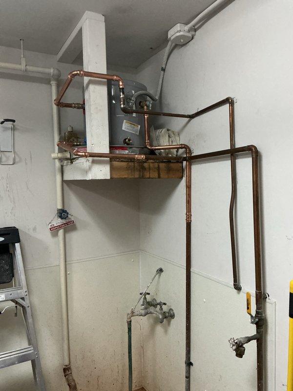 Successfully installed a 6-gallon electric water heater in the mechanical room. The compact unit was positioned and secured in the designated utility space, with all electrical connections completed per manufacturer specifications and local code requirements. Connected copper supply lines and installed appropriate shut-off valves for serviceability. Verified proper operation, tested for leaks, and ensured all safety features were functioning correctly upon completion.