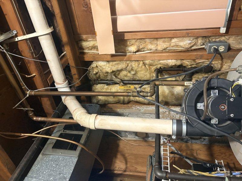 Completed scheduled air conditioning tune-up and preventive maintenance inspection. Performed comprehensive system evaluation including inspection of mechanical components, ductwork, and associated HVAC equipment in basement utility area. All systems checked and found operating within normal parameters.