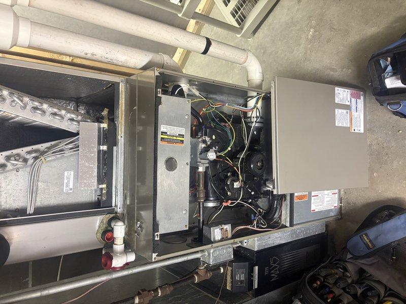 Completed comprehensive tune-up and preventive maintenance on multi-zone HVAC system including air conditioning and gas furnace units. Performed full system inspection with access panel removal, verified heat exchanger integrity, checked electrical connections and control components, inspected blower motor assembly, examined refrigerant line connections, and assessed condensate drain lines for proper operation.