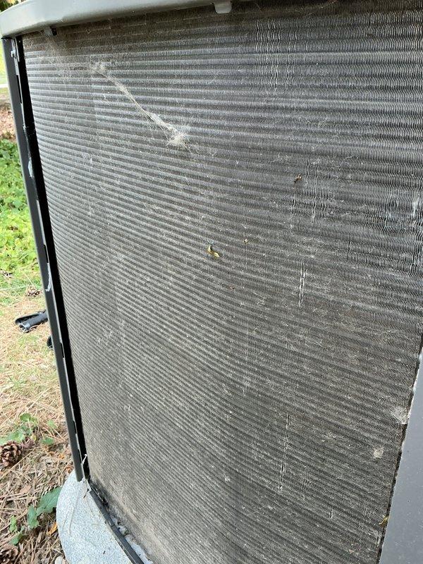 Completed comprehensive AC tune-up on 2022 Lennox condenser unit. Performed standard preventive maintenance inspection including examination of condenser coils, fan operation, and overall system condition. Unit photographed and documented showing normal wear patterns consistent with age, with system operating within manufacturer specifications.