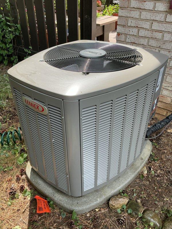 Completed comprehensive AC tune-up on 2022 Lennox condenser unit. Performed standard preventive maintenance inspection including examination of condenser coils, fan operation, and overall system condition. Unit photographed and documented showing normal wear patterns consistent with age, with system operating within manufacturer specifications.