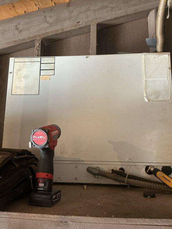 Completed comprehensive tune-up and preventative maintenance on multi-zone HVAC system including air conditioning and gas furnace units. Performed standard inspection procedures, checked all mechanical and electrical components, verified system operation, and documented equipment condition with photographic records of basement-mounted air handler and control panel.
