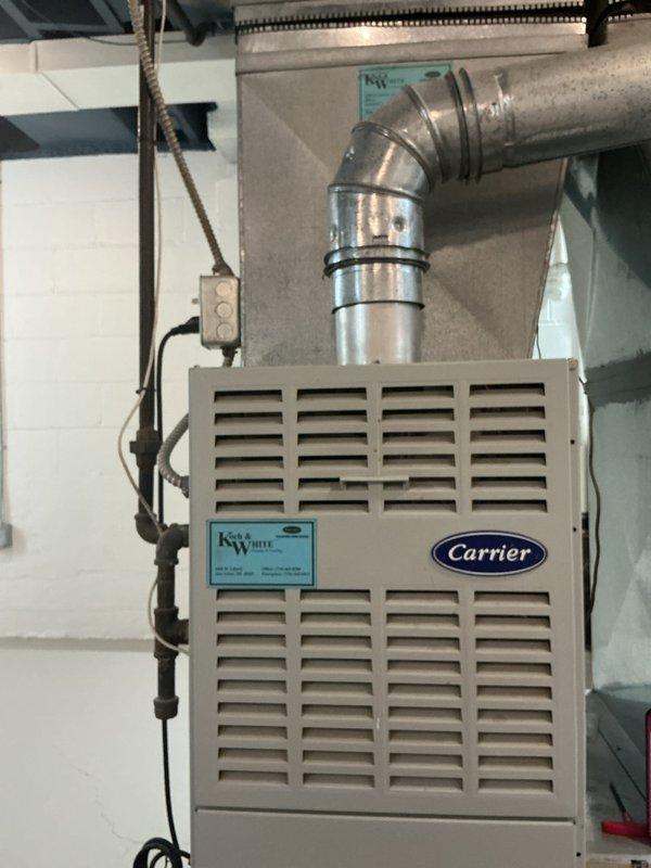 Completed comprehensive tune-up service on 20-year-old Carrier HVAC system. Performed full system inspection including blower motor assembly, gas valve controls, burner assembly, and electrical connections. Completed and provided city certificate documentation as requested.