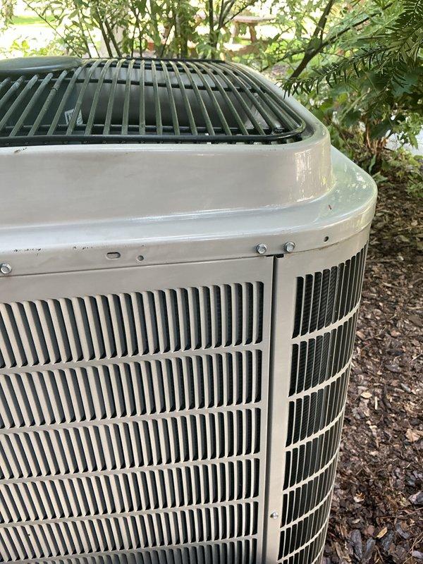 Completed annual membership renewal and comprehensive air conditioning tune-up on residential outdoor condensing unit. Performed full system inspection, confirmed unit operational status, and documented equipment condition with photos showing well-maintained cabinet, intact protective grilles, and properly functioning components in good working order.