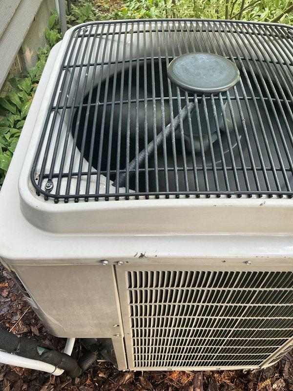 Completed annual membership renewal and comprehensive air conditioning tune-up on residential outdoor condensing unit. Performed full system inspection, confirmed unit operational status, and documented equipment condition with photos showing well-maintained cabinet, intact protective grilles, and properly functioning components in good working order.