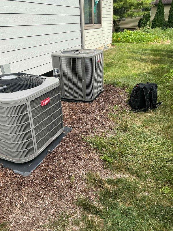 Completed installation of new Bryant air conditioning condenser unit and evaporator coil system at residential property. Unit was positioned on concrete pad with proper clearances, refrigerant lines connected and charged to manufacturer specifications, electrical connections completed, and system tested to verify optimal cooling performance.