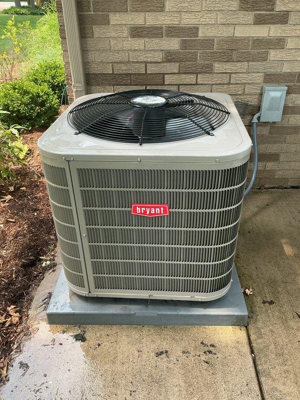Completed comprehensive AC tune-up on Bryant outdoor condensing unit. Performed standard preventive maintenance including inspection of condenser coils, fan motor operation, refrigerant levels, electrical connections, and disconnect box. Unit operating within normal parameters with no deficiencies noted. Equipment found in excellent condition with proper airflow through louvers and clean exterior surfaces.