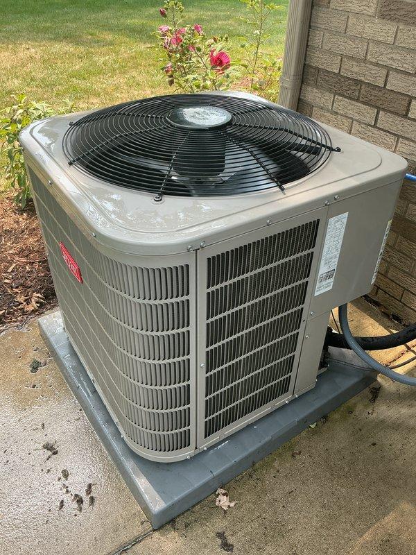 Completed comprehensive AC tune-up on Bryant outdoor condensing unit. Performed standard preventive maintenance including inspection of condenser coils, fan motor operation, refrigerant levels, electrical connections, and disconnect box. Unit operating within normal parameters with no deficiencies noted. Equipment found in excellent condition with proper airflow through louvers and clean exterior surfaces.