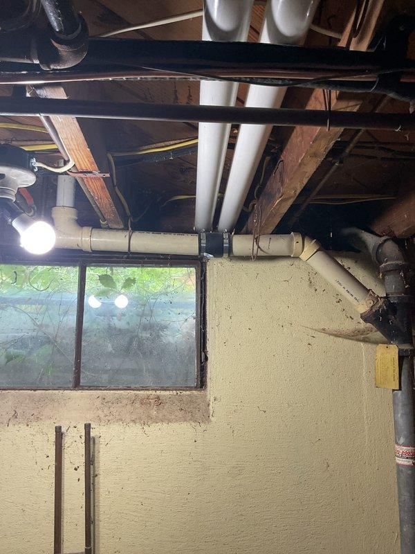 Completed full HVAC system installation in residential basement, including new Bryant furnace and heat pump system. Installed all required PVC venting pipes, flexible ductwork connections, and electrical components per manufacturer specifications. All equipment mounted securely to structural framing, system tested and operational.