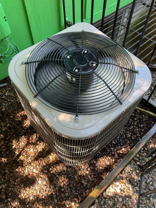 Completed comprehensive multi-system tune-up service on air conditioning unit and water heater. Performed standard preventive maintenance procedures on outdoor condenser unit, including inspection of fan motor assembly, verification of proper airflow through louvered panels, and assessment of overall system operation. Unit found in functional condition with normal signs of outdoor weathering; all components operating within acceptable parameters.