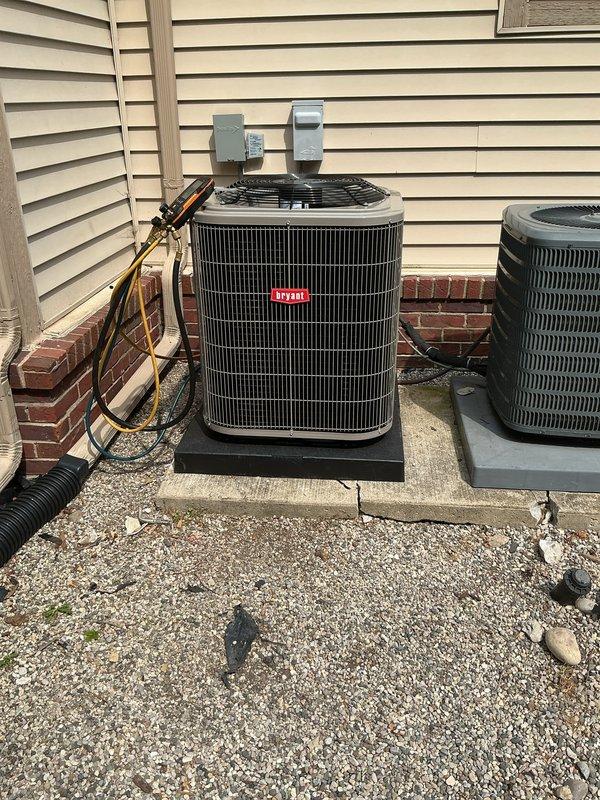 Successfully completed full HVAC system replacement including new furnace, air conditioner, humidifier, and water heater. Installed Bryant condensing unit on gravel pad with proper refrigerant line routing and electrical disconnect boxes mounted to exterior siding. All plumbing connections, condensate drainage, and mechanical components secured and tested for proper operation. System commissioned and financing documentation completed.