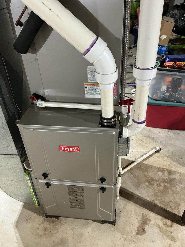Completed scheduled air conditioning tune-up on 2019 Bryant HVAC system. Performed comprehensive maintenance inspection of both indoor furnace unit and outdoor condenser unit, verifying proper operation of all components, checking refrigerant levels, cleaning coils, and ensuring optimal system performance for continued reliable cooling operation.