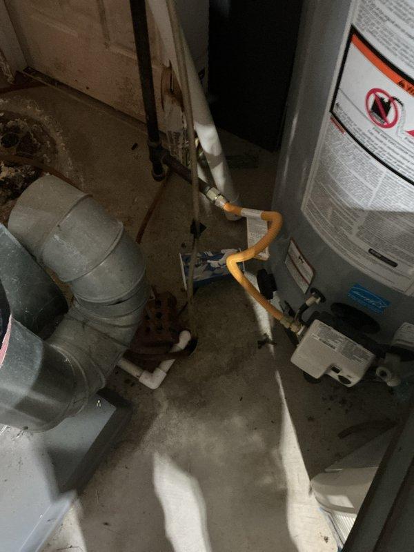 Completed installation of new air conditioning system in residential property. Installed indoor air handler unit in basement utility area with proper drainage connections using PVC piping and condensate discharge line. Ran refrigerant lineset through wall penetration to outdoor unit location. Secured electrical conduit and wiring throughout installation per code requirements. Connected ductwork to new air handler with proper sealing at all joints. Verified all mechanical, electrical, and refrigerant connections were properly installed and secured. System tested and operational upon completion.