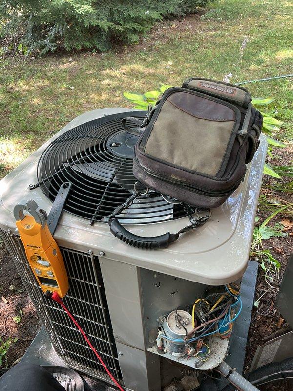 Completed scheduled AC tune-up and preventive maintenance on residential cooling system. Performed comprehensive inspection of outdoor condensing unit, checked refrigerant pressures and levels, verified electrical connections, and confirmed proper operation of all components. System tested and operating within normal parameters upon completion.
