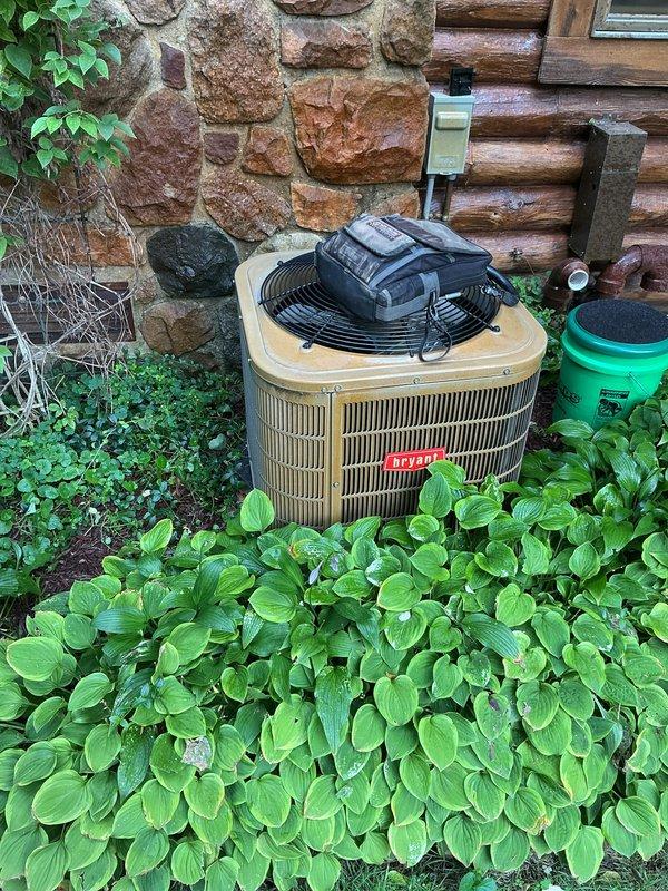 Completed preventative maintenance on Bryant outdoor condensing unit. Performed system inspection, replaced air filter, and processed annual maintenance renewal. Unit operating within normal parameters with adequate airflow through condenser coils and proper clearance from surrounding landscape.