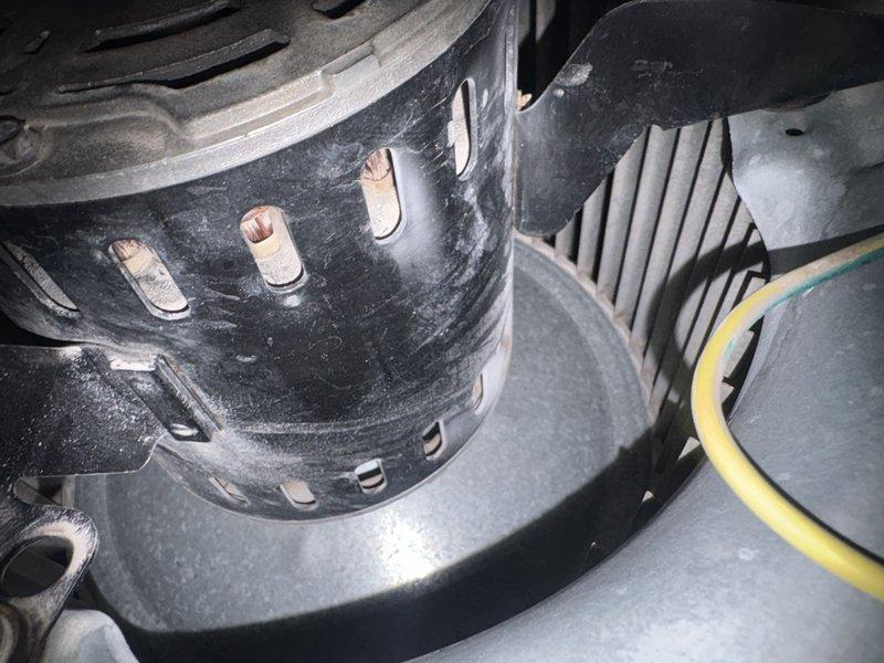 Responded to no cooling call on 5-year-old residential air conditioning system. Upon inspection, diagnosed failed blower motor preventing air circulation throughout home. Removed and replaced defective blower motor assembly, reconnected all electrical connections, and verified proper operation. System restored to full cooling capacity with adequate airflow to all areas of residence.