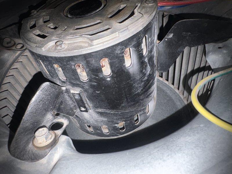 Responded to no cooling call on 5-year-old residential air conditioning system. Upon inspection, diagnosed failed blower motor preventing air circulation throughout home. Removed and replaced defective blower motor assembly, reconnected all electrical connections, and verified proper operation. System restored to full cooling capacity with adequate airflow to all areas of residence.