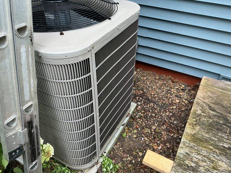 Completed scheduled air conditioning tune-up and preventive maintenance on residential cooling system. Performed comprehensive inspection of outdoor condenser units, verified proper operation of compressor and fan motors, and documented equipment condition with photos showing units in good working order with normal weathering for outdoor equipment.