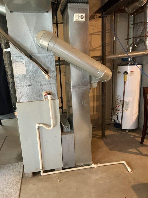 Responded to service call for AC unit blowing warm air instead of cooling. Upon arrival, inspected 1999 HVAC system located in basement mechanical room. Diagnosed cooling system malfunction and completed necessary repairs to restore proper operation. Unit tested and verified to be cooling effectively before departure.