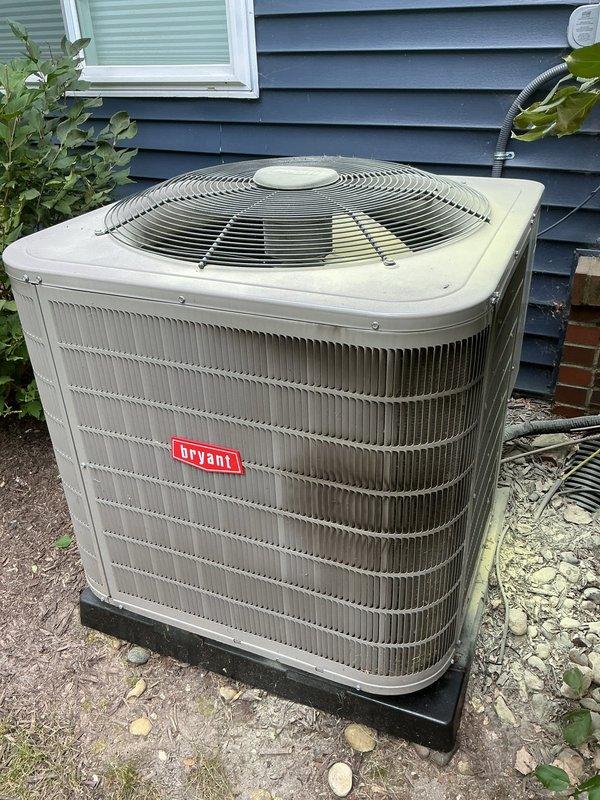 Responded to service call for non-operational Bryant outdoor condensing unit. Upon arrival, diagnosed blown fuse in exterior disconnect box as cause of system failure. Replaced failed fuse and restored power to unit. Verified proper system operation with condenser fan running and unit cycling normally. Unit returned to full operational status.