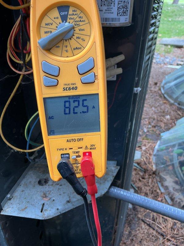 Completed scheduled AC tune-up and preventative maintenance on outdoor condensing unit. Performed electrical diagnostics using multimeter, measuring amperage draw at 82.5 amps to verify compressor operation within manufacturer specifications. Inspected internal components including refrigerant lines, electrical connections, and capacitor. System tested and confirmed operating properly in cooling mode.