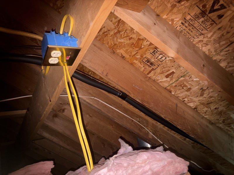 Responded to service call for older AC unit not cooling upstairs living space. Performed diagnostic inspection of attic-mounted HVAC system, accessing unit through attic crawlspace. Conducted visual assessment of ductwork, insulation integrity, and equipment condition. Documented attic installation with photos showing OSB decking, pink fiberglass insulation, structural framing, and horizontal duct runs. Collected standard service fee and presented repair options to address cooling deficiency. Overtime service was offered but declined.