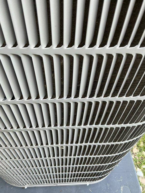 Completed comprehensive air conditioning maintenance on Bryant outdoor condensing unit. Performed standard tune-up procedures including inspection of condenser coils, fan assembly, and exterior housing. Unit found in operational condition with protective grille properly secured and minimal debris accumulation on exterior fins.