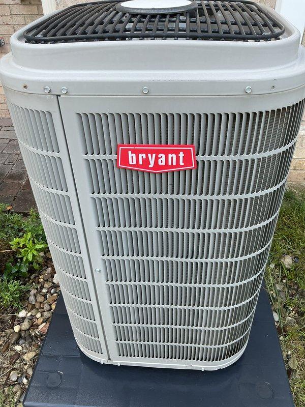 Completed comprehensive air conditioning maintenance on Bryant outdoor condensing unit. Performed standard tune-up procedures including inspection of condenser coils, fan assembly, and exterior housing. Unit found in operational condition with protective grille properly secured and minimal debris accumulation on exterior fins.
