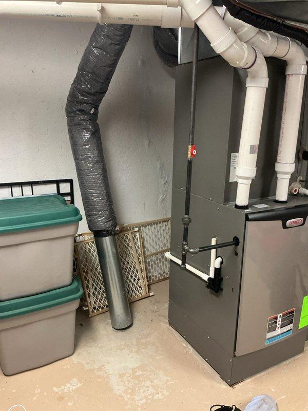 Completed scheduled air conditioning tune-up and maintenance service. Upon inspection, discovered significant dust and debris accumulation on evaporator coil and heat exchange fins, which was thoroughly cleaned to restore proper airflow and heat transfer efficiency. Inspected furnace unit, ductwork connections, PVC condensate drainage lines, and air filtration system; all components found to be properly secured and operational following maintenance procedures.