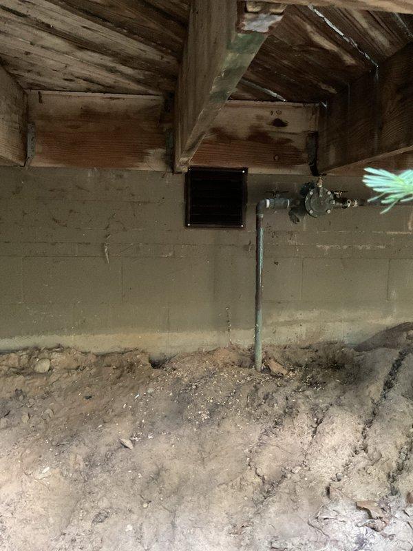 Installed Renewaire Energy Recovery Ventilator (ERV) unit in crawl space with complete ductwork integration. Mounted ERV equipment to structural supports, connected insulated flexible ductwork for fresh air intake and stale air exhaust, and established proper electrical connections. System commissioned and tested to ensure balanced ventilation and optimal indoor air quality performance.