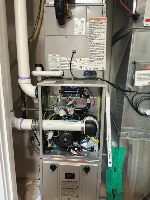 Completed comprehensive preventive maintenance tune-up on multi-system HVAC installation consisting of two air conditioning units and two gas furnaces. Performed standard inspection procedures on all four units including Bryant-branded furnace systems, verified operational status of blower motors, checked electrical connections and wiring integrity, inspected condensate drainage and PVC venting systems, and confirmed proper function of all safety controls and manufacturer-specified components. All equipment found operating within normal parameters with no deficiencies noted at time of service.