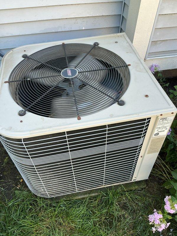 Completed routine maintenance on residential air conditioning system. Inspected outdoor condensing unit, verified proper fan operation, checked refrigerant levels, and cleaned condenser coils. Unit operating within normal parameters with no deficiencies noted.