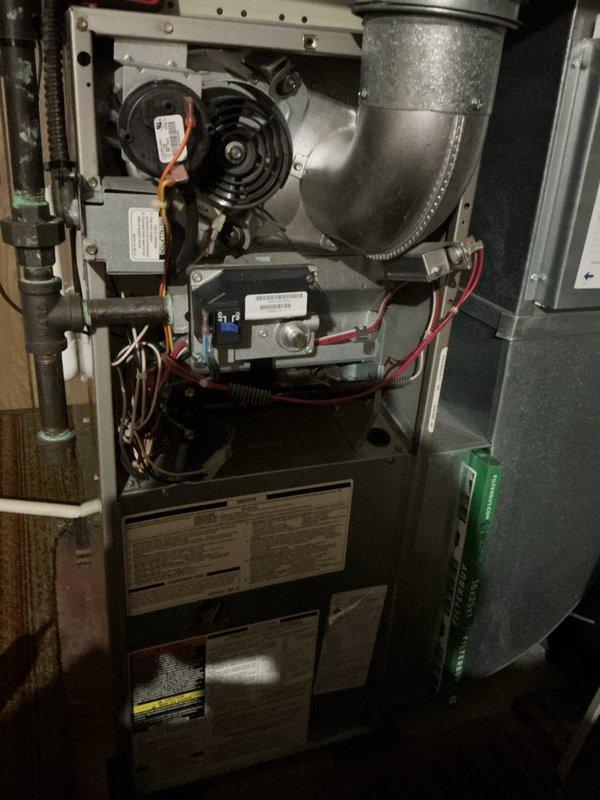 Completed membership maintenance tune-up on residential gas furnace and air conditioning system. Performed comprehensive inspection of furnace components including blower motor assembly, gas valves, control board with operational LED indicator, safety switches, and electrical connections. Verified proper operation of all internal mechanical systems, checked air filter condition, and inspected ductwork connections. System operating within manufacturer specifications with all components functioning properly.