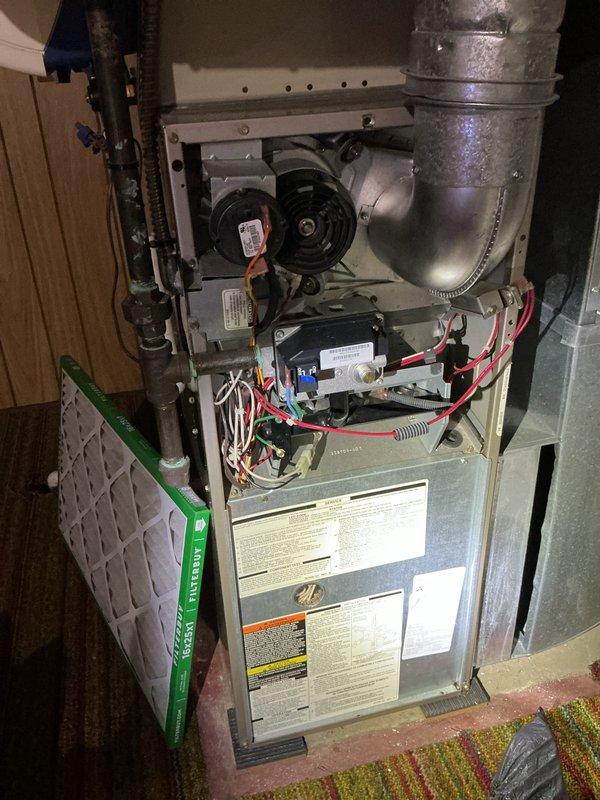 Completed membership maintenance tune-up on residential gas furnace and air conditioning system. Performed comprehensive inspection of furnace components including blower motor assembly, gas valves, control board with operational LED indicator, safety switches, and electrical connections. Verified proper operation of all internal mechanical systems, checked air filter condition, and inspected ductwork connections. System operating within manufacturer specifications with all components functioning properly.