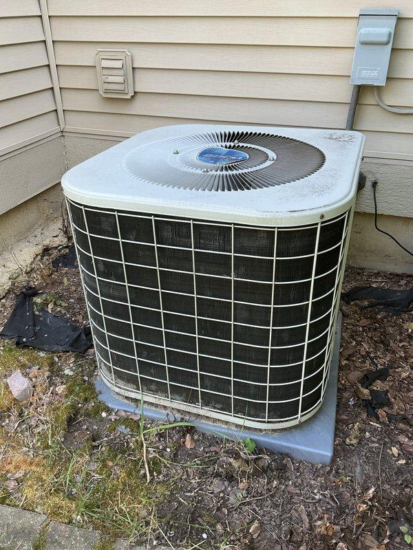 Completed comprehensive tune-up on 15-year-old residential air conditioning system in response to high energy bills and concerns about unit overworking. Performed full inspection of outdoor condenser unit, cleaned heat exchanger coils, checked refrigerant levels, tested electrical components, and verified proper airflow through condenser grille. System returned to optimal operating parameters with improved efficiency expected to reduce energy consumption.