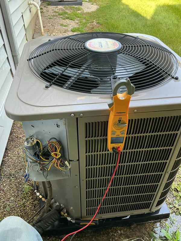 Completed comprehensive air conditioning tune-up on 5-year-old residential condensing unit. Performed electrical diagnostics using digital multimeter, verified proper voltage and amperage at disconnect, inspected all electrical connections, and confirmed system operational parameters within manufacturer specifications.