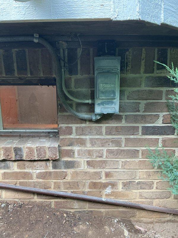 Responded to no cooling complaint and found outdoor condenser unit with frozen suction line and service valve. Diagnosed refrigerant restriction causing ice formation on low-pressure side of system. Thawed frozen components, identified cause of restriction, and restored proper system operation with normal suction pressures and temperatures.
