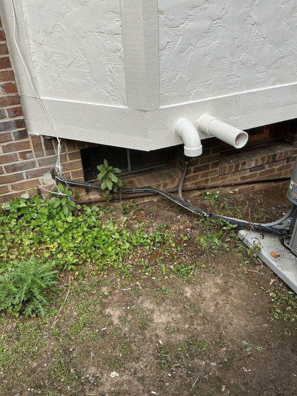 Responded to no cooling complaint and found outdoor condenser unit with frozen suction line and service valve. Diagnosed refrigerant restriction causing ice formation on low-pressure side of system. Thawed frozen components, identified cause of restriction, and restored proper system operation with normal suction pressures and temperatures.