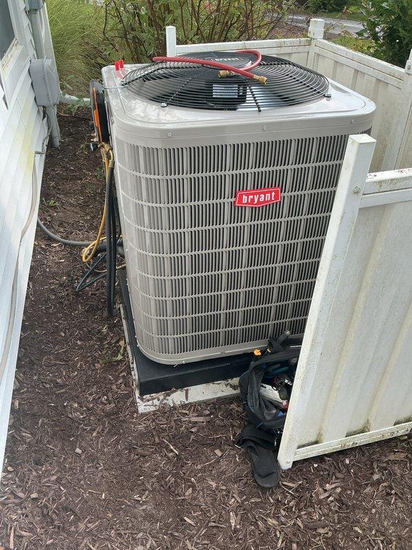 Completed full HVAC system installation including two furnace and air conditioner combinations, one whole-home humidifier, and one air purification system. Successfully installed Bryant outdoor condensing unit (Model 134SAN01880NAD) with factory refrigerant charge of 3.98 lbs and TXV metering device, positioned on composite pad in side yard location with proper clearances. Ran insulated refrigerant line sets, established electrical connections via conduit, and verified all equipment specifications per manufacturer requirements. All units tested and operational upon completion.