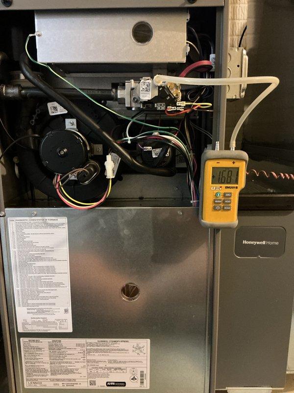 Performed comprehensive tune-up and preventive maintenance on 2024 gas furnace unit. Conducted thorough system inspection with access panel removed, tested electrical components and connections using digital multimeter, verified blower motor operation, and measured system parameters with diagnostic equipment. All components found operating within manufacturer specifications; unit running efficiently with no issues identified.